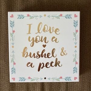 “I love you a bushel and a peck” sign